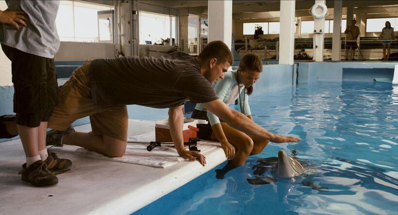 Austin Stowell as Kyle Connellan, Austin Highsmith as Phoebe and Winter in "Dolphin Tale."