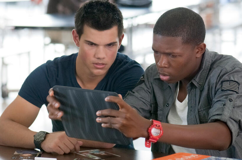 Taylor Lautner as Nathan and Denzel Whitaker as Gilly in "Abduction."
