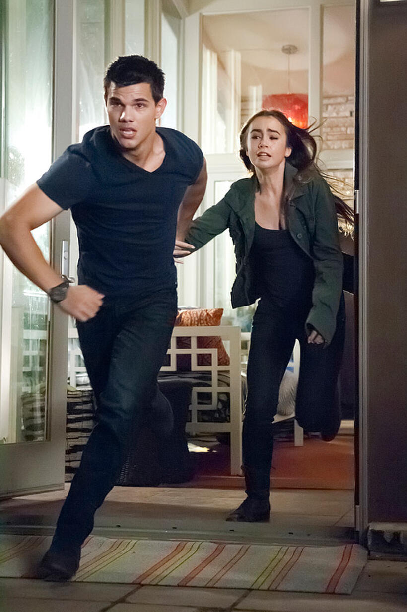 Taylor Lautner as Nathan and Lily Collins as Karen in "Abduction."