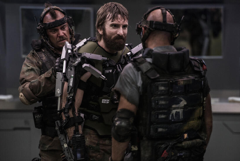 Brandon Auret as Drake, Sharlto Copley as Kruger and Josh Blacker as Crowe in "Elysium."