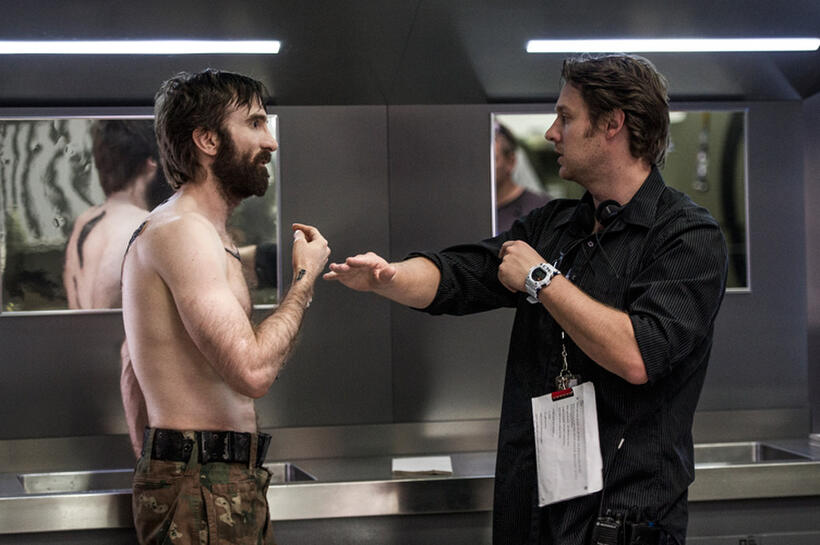 Sharlto Copley and director Neill Blomkamp on the set of "Elysium."