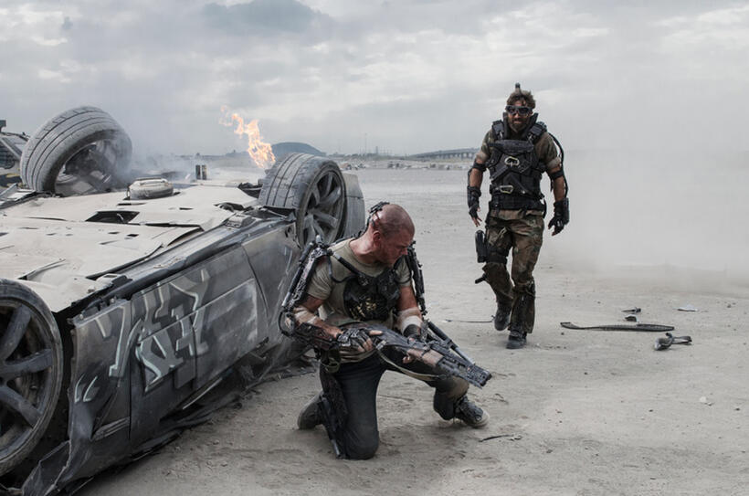 Matt Damon and Sharlto Copley in "Elysium."