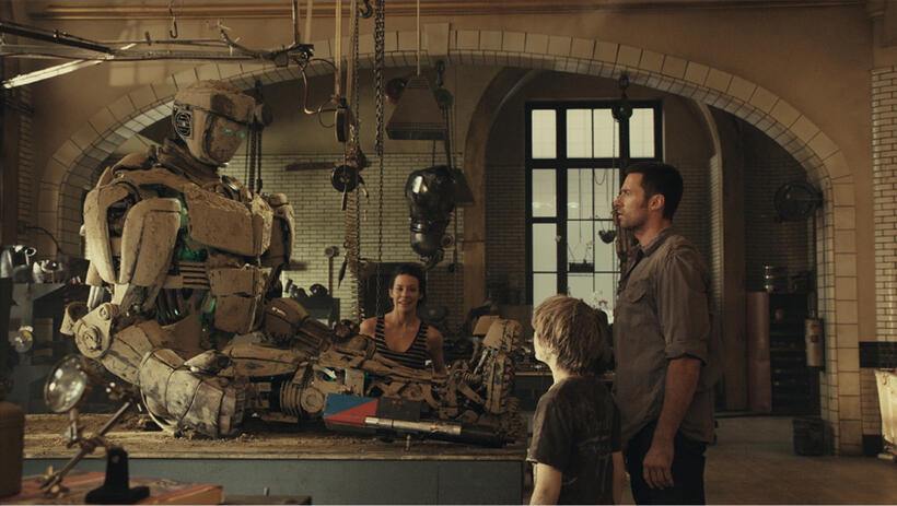 Atom, Evangeline Lilly, Dakota Goyo and Hugh Jackman in "Real Steel."