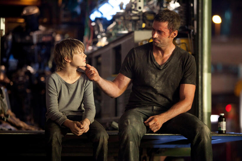Dakota Goyo as Max and Hugh Jackman as Charlie Kenton in "Real Steel."