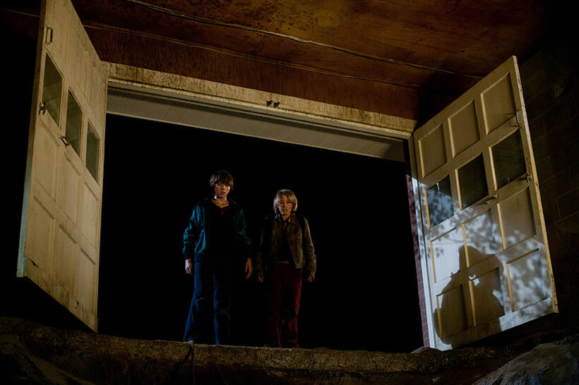 Joel Courtney as Joe Lamb and Ryan Lee as Cary in "Super 8."