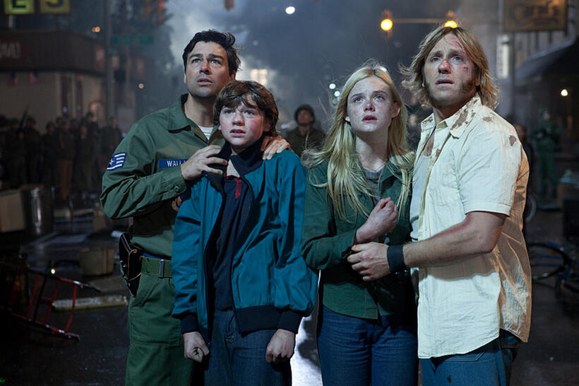 Kyle Chandler as Jackson Lamb, Joel Courtney as Joe Lamb, Elle Fanning as Alice Dainard and Ron Eldard as Louis Dainard in "Super 8."