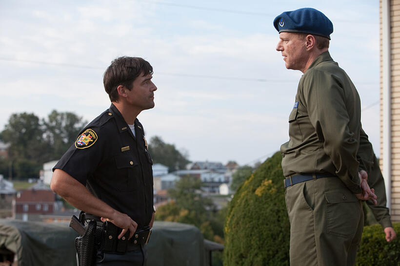 Kyle Chandler as Jackson Lamb and Noah Emmerich as Nelec in "Super 8."