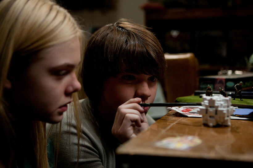 Elle Fanning as Alice Dainard and Joel Courtney as Joe Lamb in "Super 8."