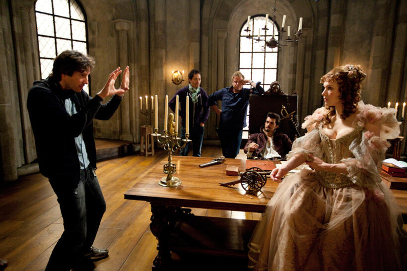 Director Paul W. S. Anderson, Orlando Bloom and Milla Jovovich on the set of "The Three Musketeers."