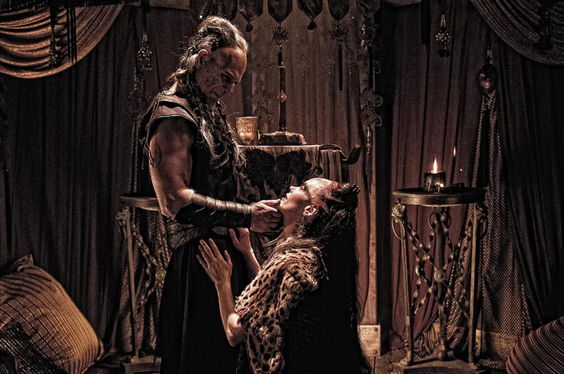Stephen Lang as Khalar Zym and Rose McGowan as Marique in "Conan the Barbarian."
