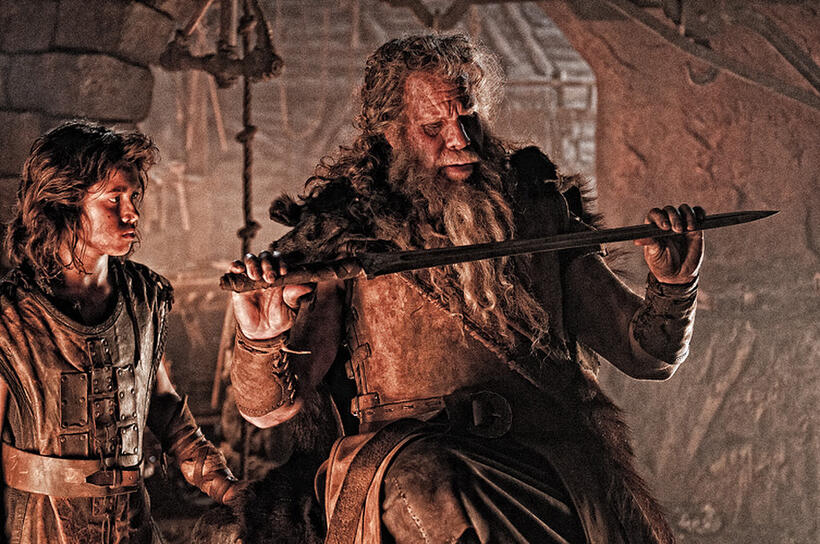 Leo Howard as Young Conan and Ron Perlman as Corin in "Conan the Barbarian."