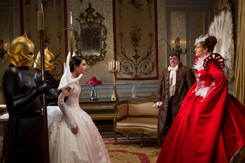 Lily Collins, Nathan Lane and Julia Roberts in "Mirror Mirror."