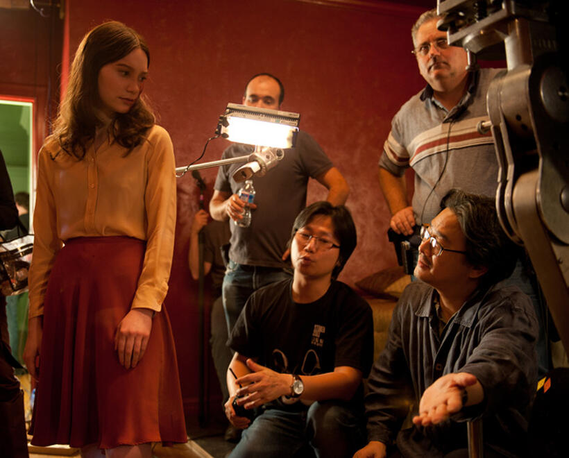Mia Wasikowska and director Chan-wook Park on the set of "Stoker."
