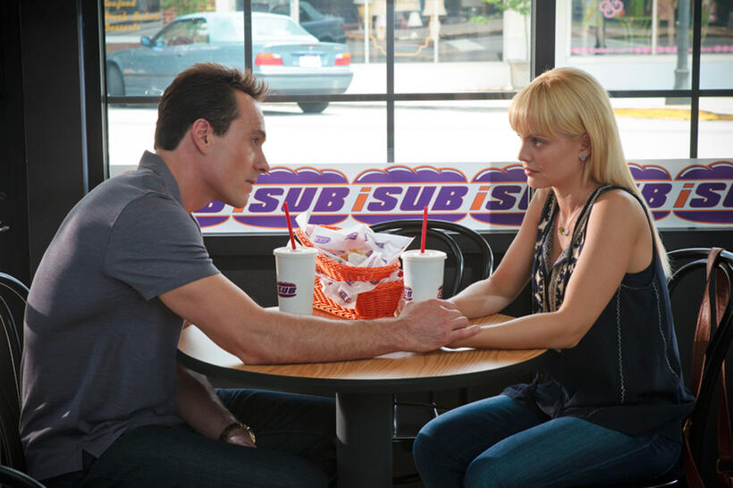 Chris Klein as Oz and Mena Suvari as Heather in "American Reunion."