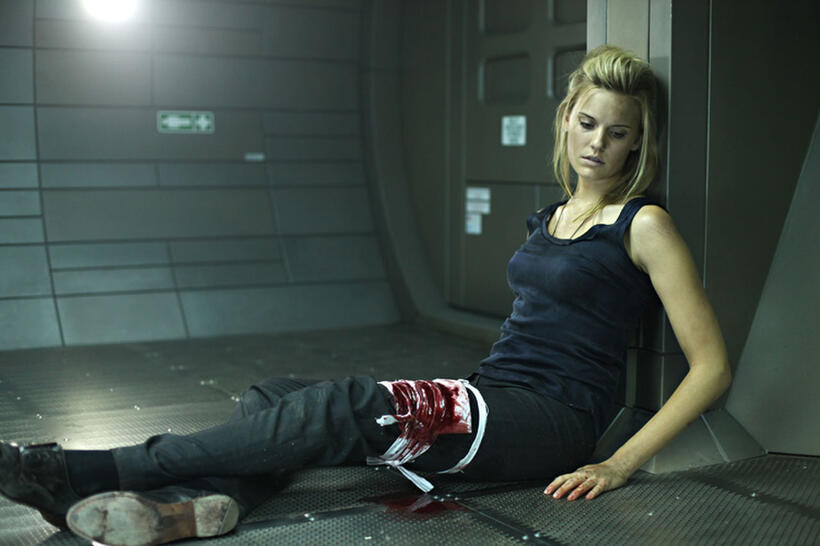 Maggie Grace as Emilie Warnock in "Lockout."