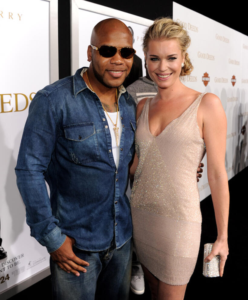Rapper Flo Rida and Rebecca Romijn at the California premiere of "Tyler Perry's Good Deeds."