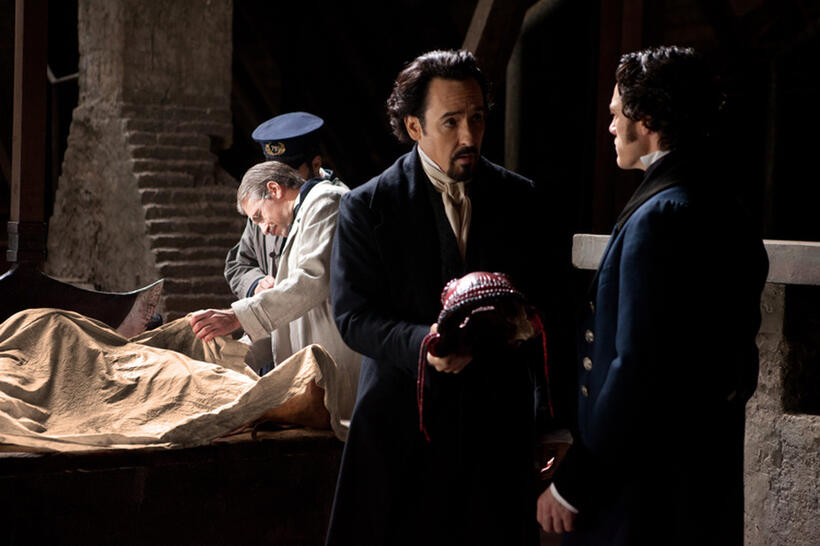 John Cusack and Luke Evans in "The Raven."