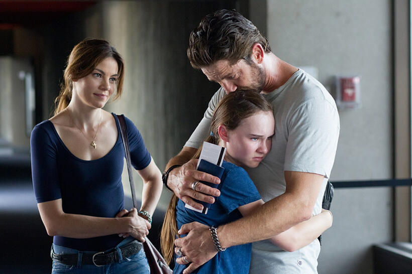 Michelle Monaghan, Madeline Carroll and Gerard Butler in "Machine Gun Preacher."