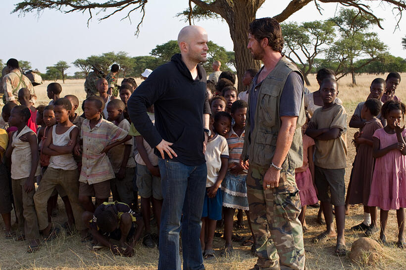Director Marc Forster and Gerard Butler on the set of "Machine Gun Preacher."