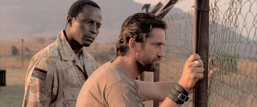 Souleymane Sy Savane and Gerard Butler in "Machine Gun Preacher."