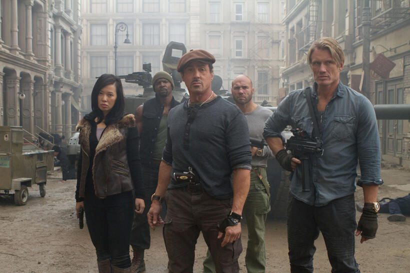 Yu Nan as Maggie, Sylvester Stallone as Barney Ross, Dolph Lundgren as Gunner Jensen, Terry Crews as Hale Caesar and Randy Couture as Toll Road in "The Expendables 2."