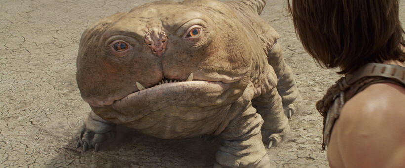 Woola and Taylor Kitsch as John Carter in "John Carter."