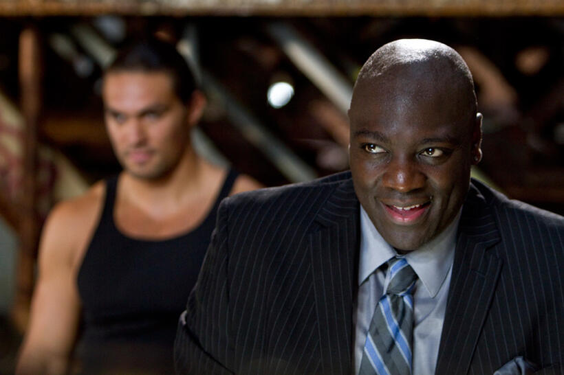 Jason Momoa as Keegan and Adewale Akinnuoye-Agbaje as Robert Nkomo Morel in "Bullet To The Head."