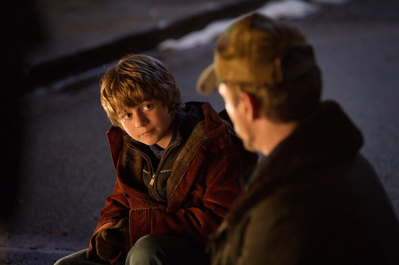 Ty Simpkins as Harley and Robert Downey, Jr. as Tony Stark in "Iron Man 3."