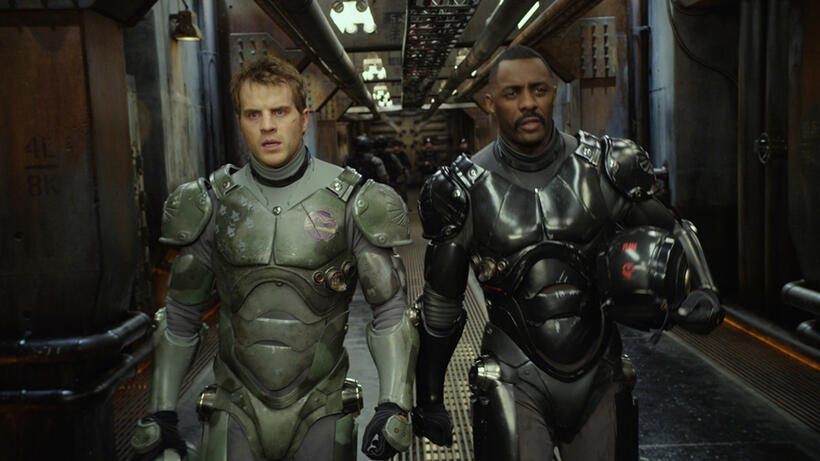 Rob Kazinsky and Idris Elba in "Pacific Rim."