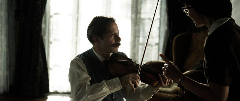 Mathieu Amalric as Nasser Ali and Maria de Medeiros as Faringuisse in "Chicken With Plums."