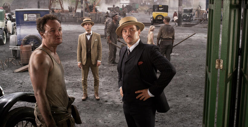 Jason Clarke as George Wilson, Tobey Maguire as Nick Carraway and Joel Edgerton as Tom Buchanan in "The Great Gatsby."