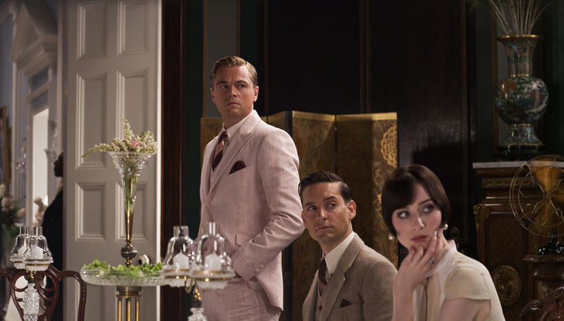 Leonardo DiCaprio as Jay Gatsby, Tobey Maguire as Nick Carraway and Elizabeth Debicki as Jordan Baker in "The Great Gatsby."