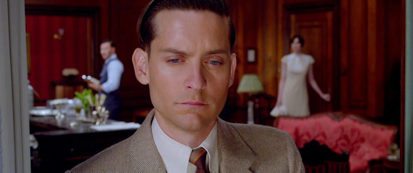 Joel Edgerton as Tom Buchanan, Tobey Maguire as Nick Carraway and Elizabeth Debicki as Jordan Baker in "The Great Gatsby."