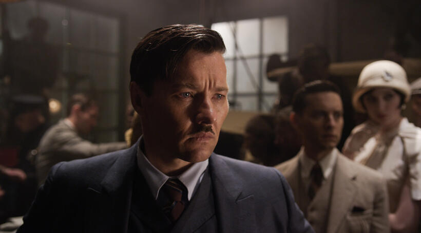 Joel Edgerton as Tom Buchanan, Tobey Maguire as Nick Carraway and Elizabeth Debicki as Jordan Baker in "The Great Gatsby."
