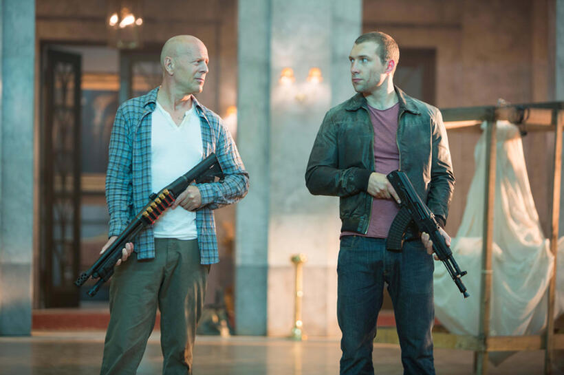 Bruce Willis as John McClane and Jai Courtney as John Genarro in "A Good Day to Die Hard."