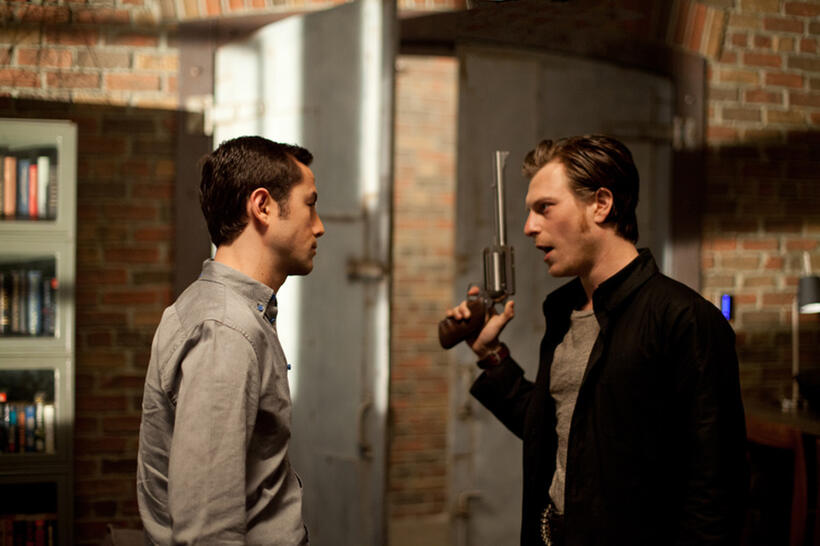 Joseph Gordon-Levitt as Joe and Noah Segan as Kid Blue in "Looper."