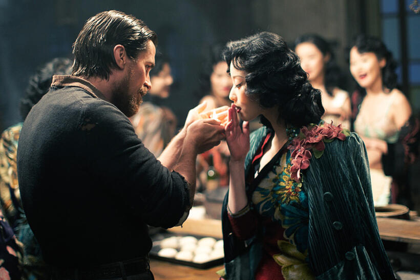 Christian Bale as John Miller and Ni Ni as Yu Mo in "The Flowers of War."