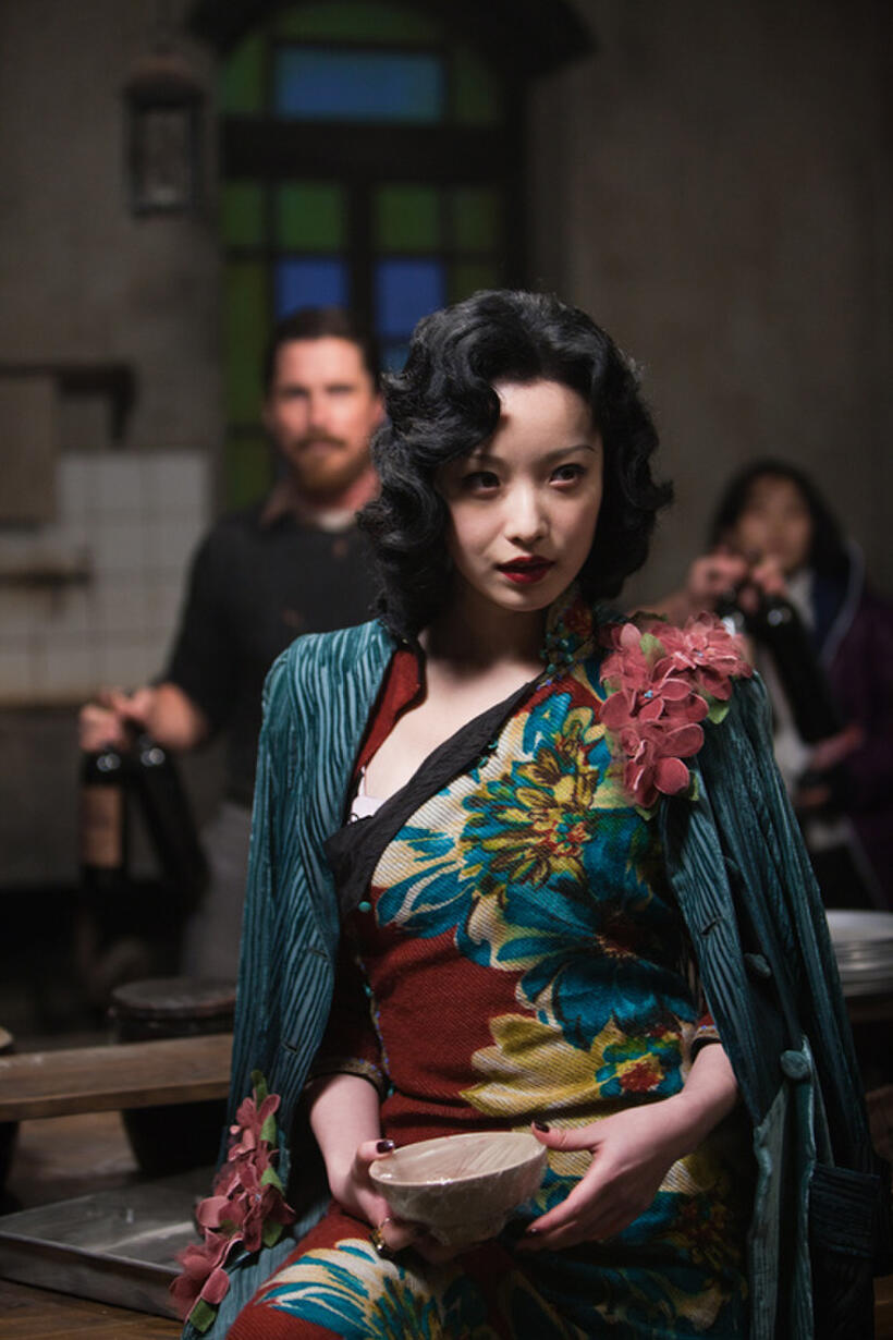 Christian Bale as John Miller and Ni Ni as Yu Mo in "The Flowers of War."
