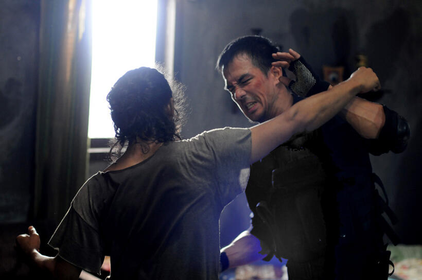 Yayan Ruhian as Mad Dog and Joe Taslim as Jaka in "The Raid."