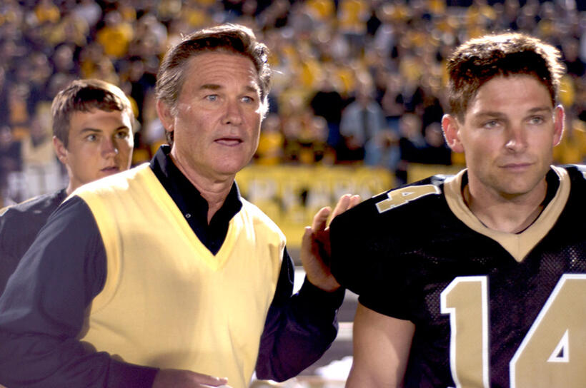 Kurt Russell as Coach Hand and Brian Presley as Scott Murphy in "Touchback."