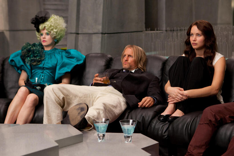 Elizabeth Banks as Effie Trinket, Woody Harrelson as Haymitch Abernathy and Jennifer Lawrence as Katniss Everdeen in "The Hunger Games."