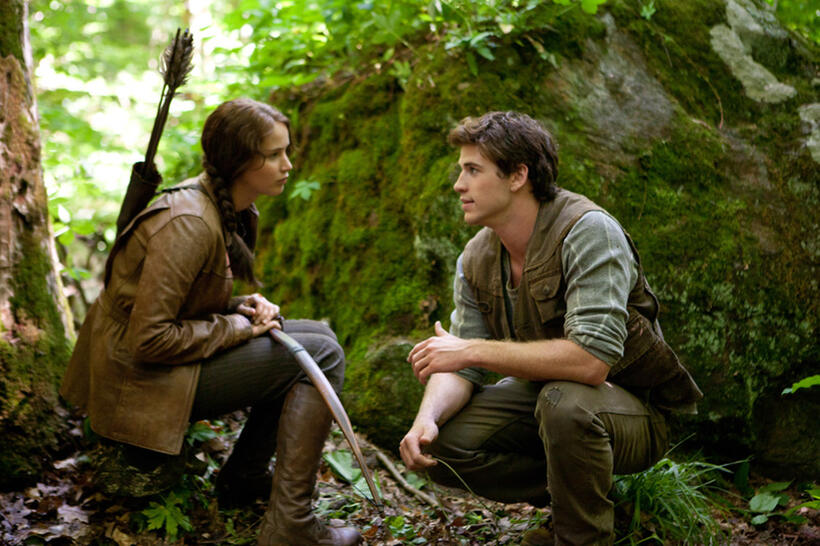 Jennifer Lawrence as Katniss Everdeen and Liam Hemsworth as Gale Hawthorne in "The Hunger Games."