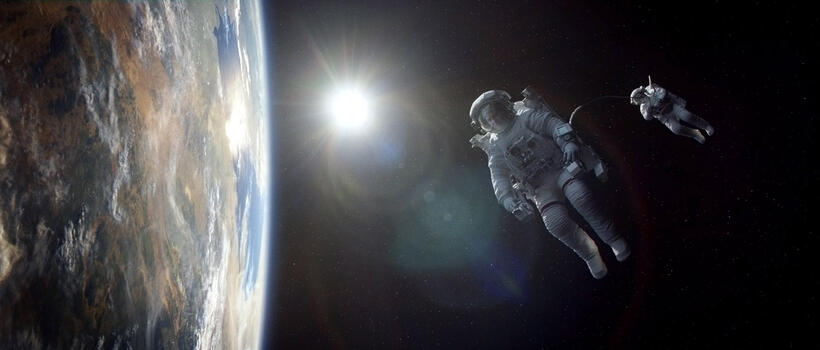 George Clooney as Matt Kowalski and Sandra Bullock as Ryan Stone in "Gravity."