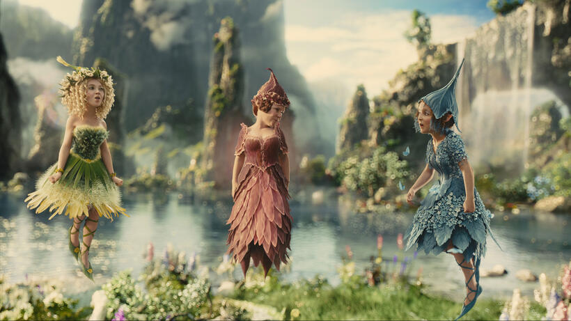 Juno Temple as Thistlewit, Imelda Staunton as Knotgrass and Lesley Manville as Flittle in "Maleficent."