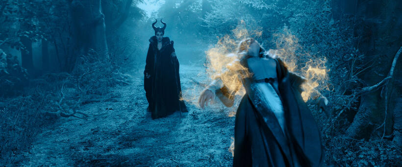 Angelina Jolie as Maleficent and Elle Fanning as Princess Aurora in "Maleficent."