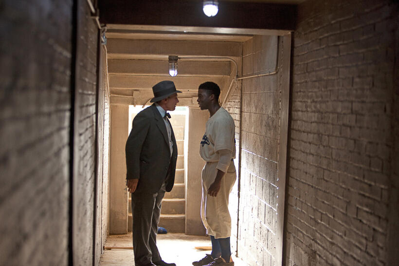 Harrison Ford as Branch Rickey and Chadwick Boseman as Jackie Robinson in "42."