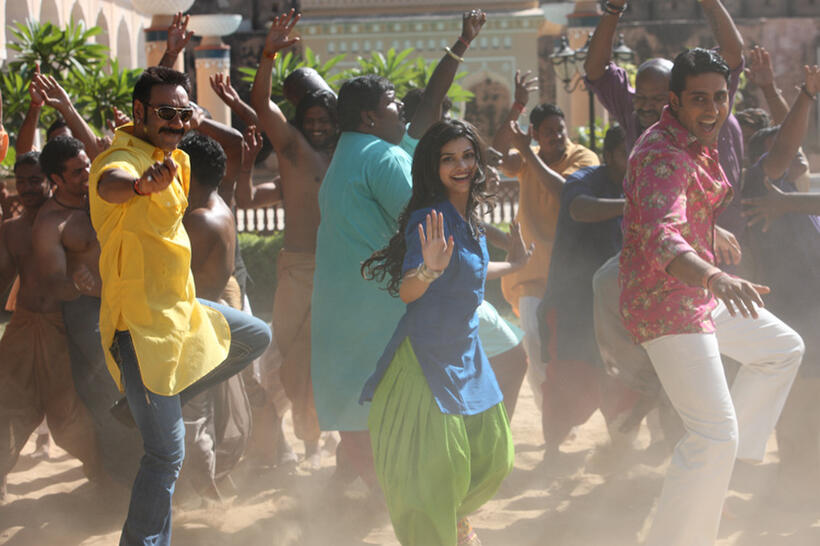 Ajay Devgn, Prachi and Abhishek Bachchan in "Bol Bachchan."