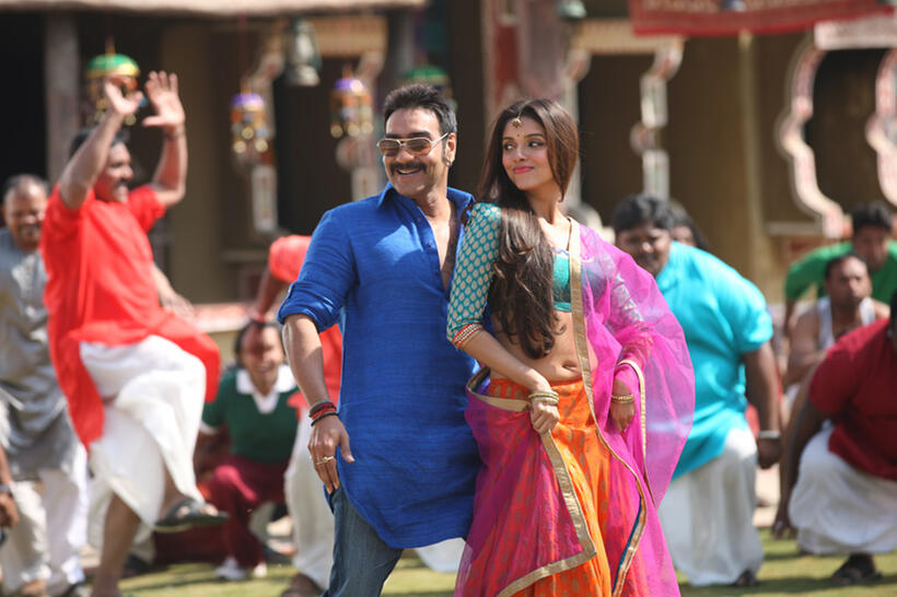 Ajay Devgn as Prithviraj Raghuvanshi and Asin Thottumkal as Sania Ali  in "Bol Bachchan."