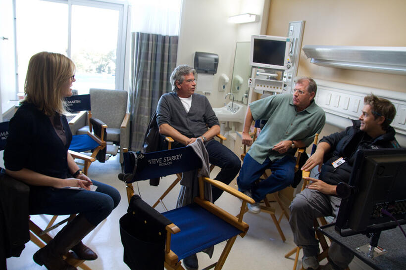 Producer Laurie MacDonald, producer Walter Parkes, director Robert Zemeckis and John Gatins on the set of "Flight."