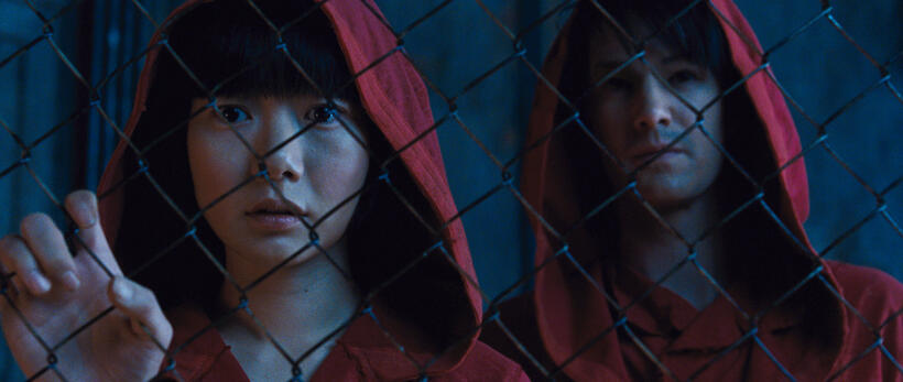 Bae Doo-na as Sonmi 451 and Jim Sturgess as Chang in "Cloud Atlas."